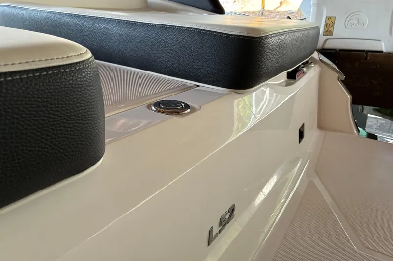 Slide: The Image of 2025 Regal LS2 boat interior with sleek seating and modern design. - 17