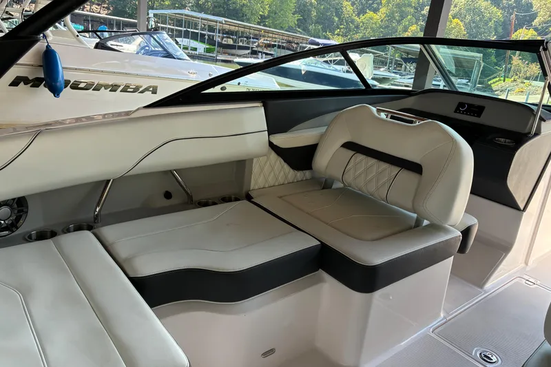 Slide: The Image of 2025 Regal LS2 boat interior with luxurious seating and modern design. - 26