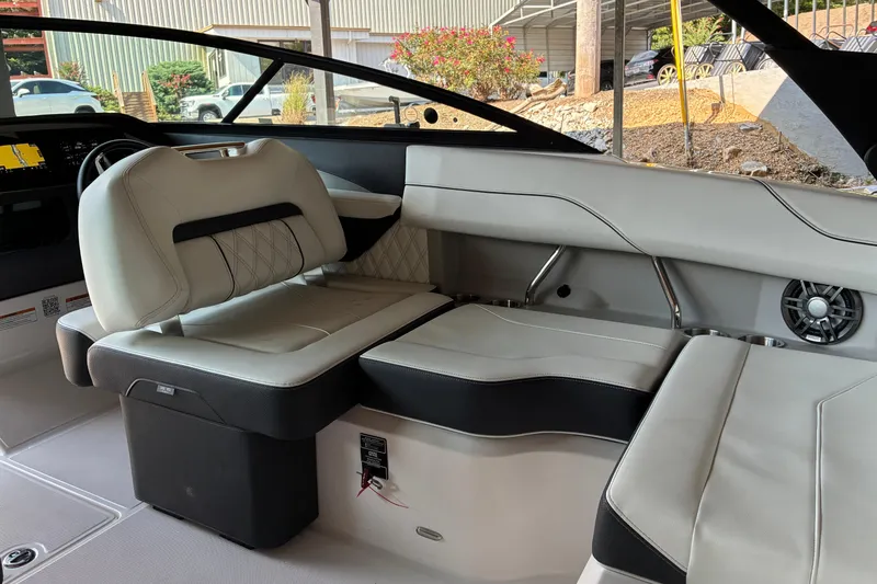Slide: The Image of 2025 Regal LS2 boat interior with luxurious seating and modern design. - 35