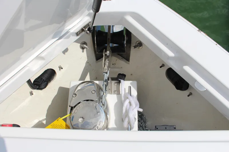 Slide: The Image of Anchor compartment of 2025 Cobalt R8 boat with chain and rope. - 17