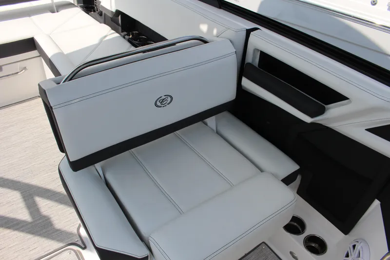 Slide: The Image of 2025 Cobalt R8 boat interior with luxurious white seating and modern design elements. - 26