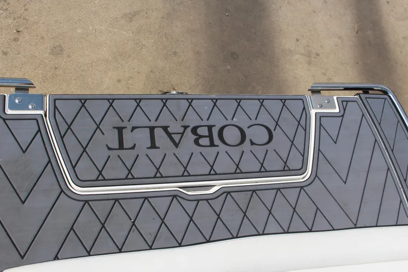 Slide: The Image of 2025 Cobalt R8 boat deck with diamond pattern and logo. - 43