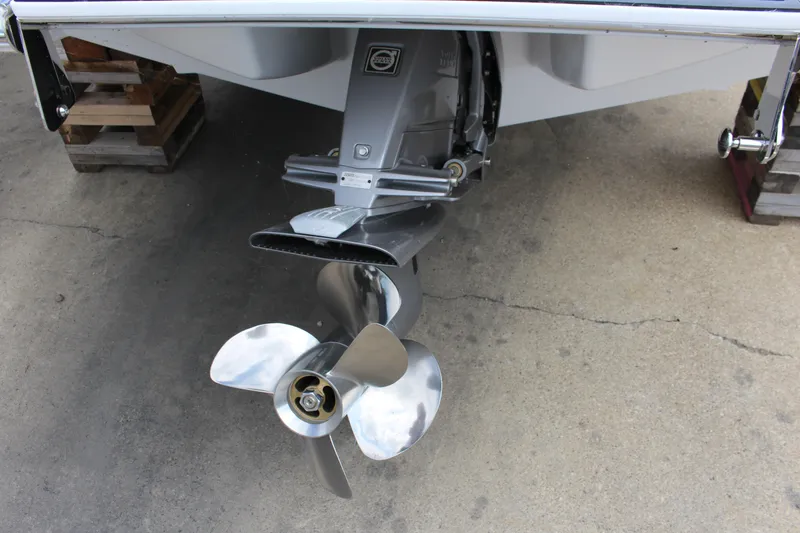 Slide: The Image of 2025 Cobalt R8 boat propeller and stern drive on concrete surface. - 7