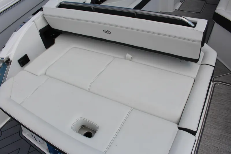 Slide: The Image of 2025 Cobalt R8 boat with white cushioned seating and sleek design. - 8