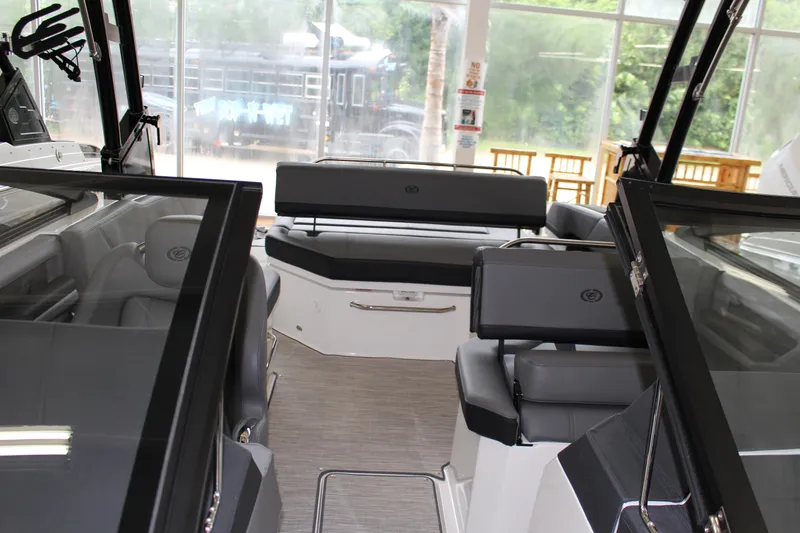 Slide: The Image of 2025 Cobalt R6 boat interior with sleek seating and modern design. - 12
