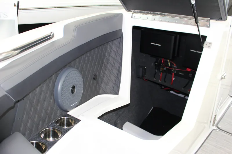 Slide: The Image of 2025 Cobalt R6 boat interior with speaker and storage compartment. - 14