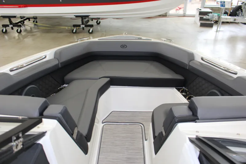 Slide: The Image of 2025 Cobalt R6 boat interior with sleek gray seating and modern design. - 15