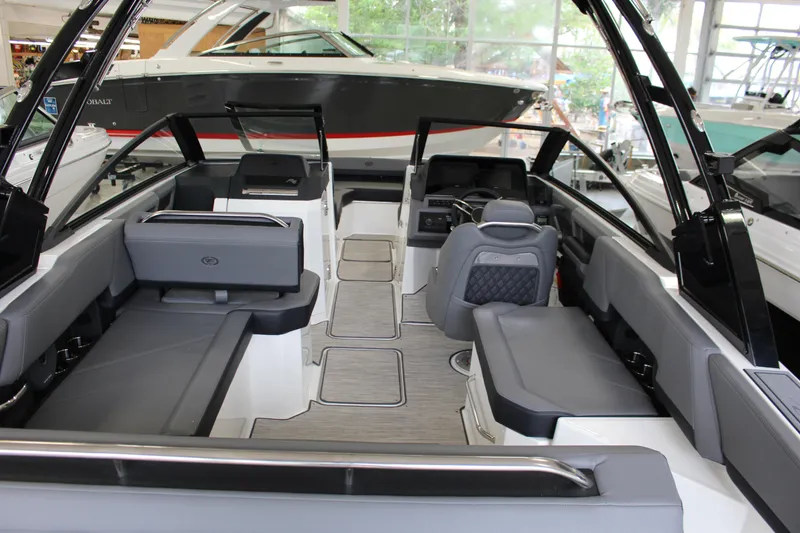 Slide: The Image of 2025 Cobalt R6 boat interior with sleek seating and modern design. - 16