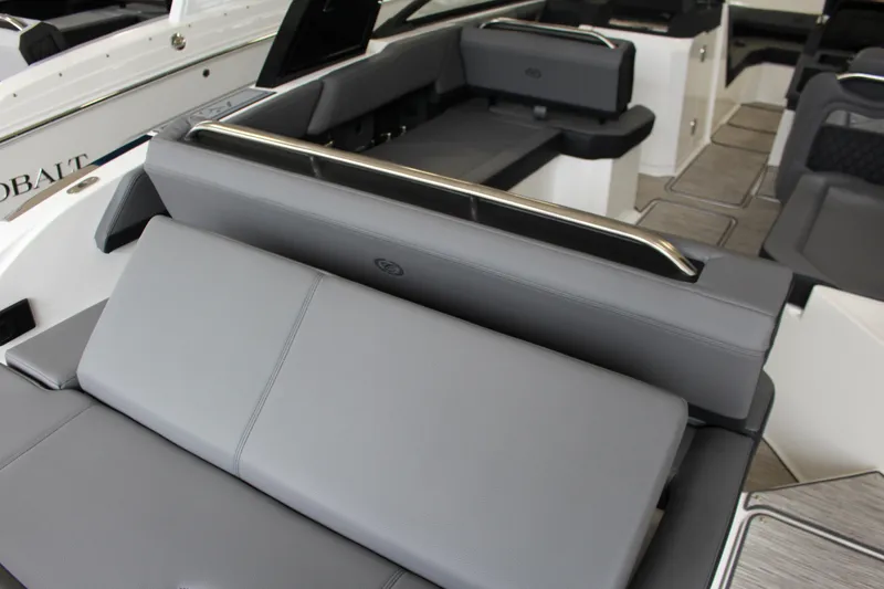 Slide: The Image of 2025 Cobalt R6 boat interior with sleek gray seating and modern design. - 4