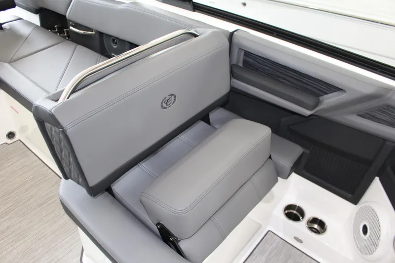 Slide: The Image of 2025 Cobalt R6 boat interior with luxurious gray seating and modern design features. - 8