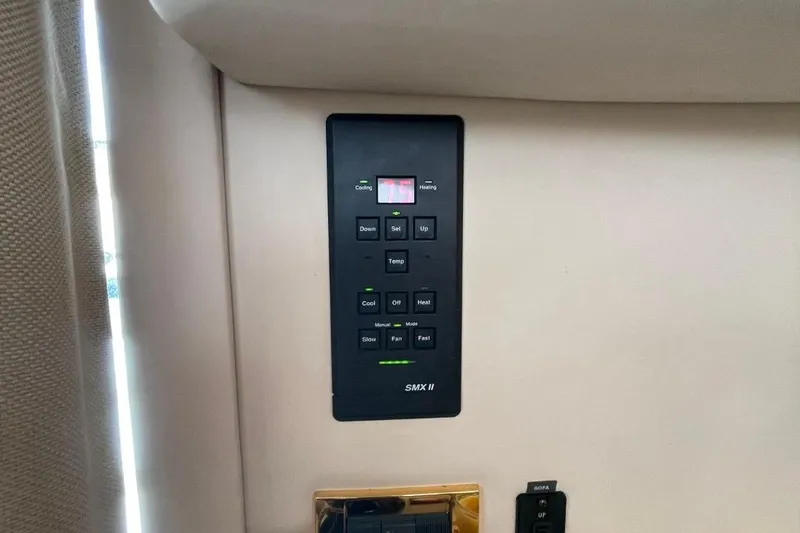 Slide: The Image of Control panel on 1998 Sea Ray 480 Sedan Bridge yacht interior. - 43