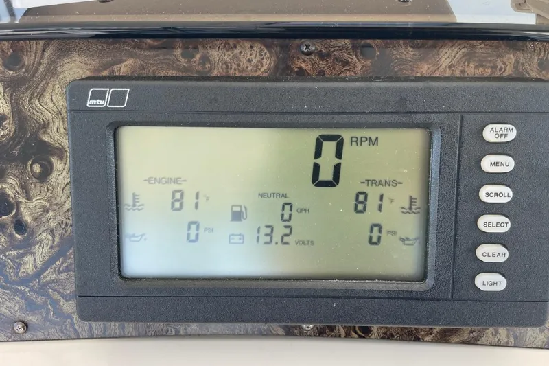 Slide: The Image of Dashboard of a 1998 Sea Ray 480 Sedan Bridge showing engine and transmission data. - 78