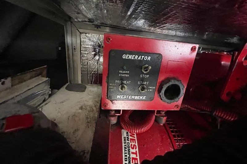 Slide: The Image of Westerbeke generator control panel on a 1998 Sea Ray 480 Sedan Bridge yacht. - 84