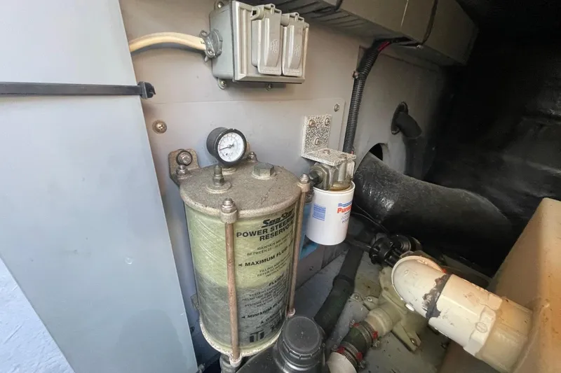 Slide: The Image of Power steering reservoir in 1998 Sea Ray 480 Sedan Bridge engine room. - 91