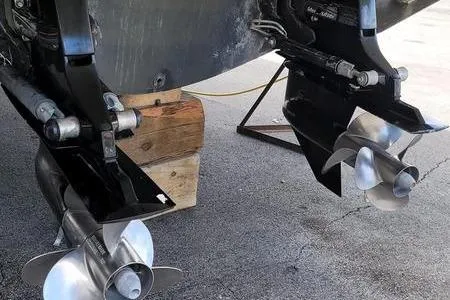 Slide: The Image of Propellers of a 2000 Doral 360 SE boat on a stand. - 18