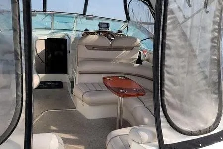 Slide: The Image of Interior of 2000 Doral 360 SE boat with seating and table. - 21