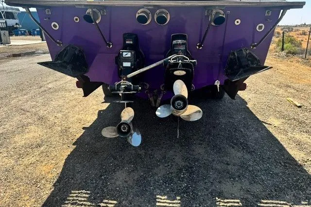 Slide: The Image of Rear view of a 1979 Wellcraft Scarab 38 boat with dual propellers. - 20