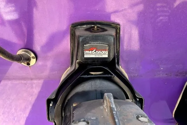 Slide: The Image of MerCruiser engine component on 1979 Wellcraft Scarab 38, purple background. - 22
