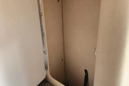 Slide: The Image of Interior view of a 2002 Sea Ray 260 Sundancer boat compartment. - 34