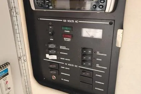 Slide: The Image of Electrical control panel on a 2002 Sea Ray 260 Sundancer boat. - 36