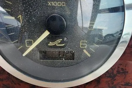 Slide: The Image of Close-up of a 2002 Sea Ray 260 Sundancer tachometer gauge. - 38