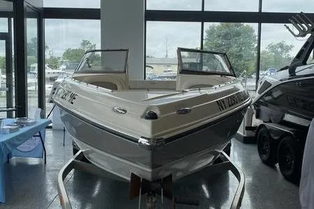 Slide: The Image of 2007 Stingray 195FX boat displayed indoors, showcasing sleek design and modern features. - 3