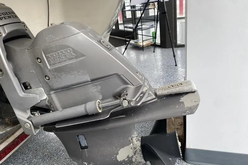 Slide: The Image of 2007 Stingray 195FX boat with Volvo Penta outboard motor, indoor setting. - 9