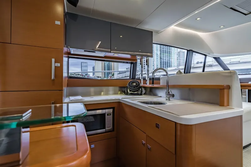 Slide: The Image of Luxurious kitchen interior of 2013 Prestige 500 Fly yacht with modern amenities. - 19