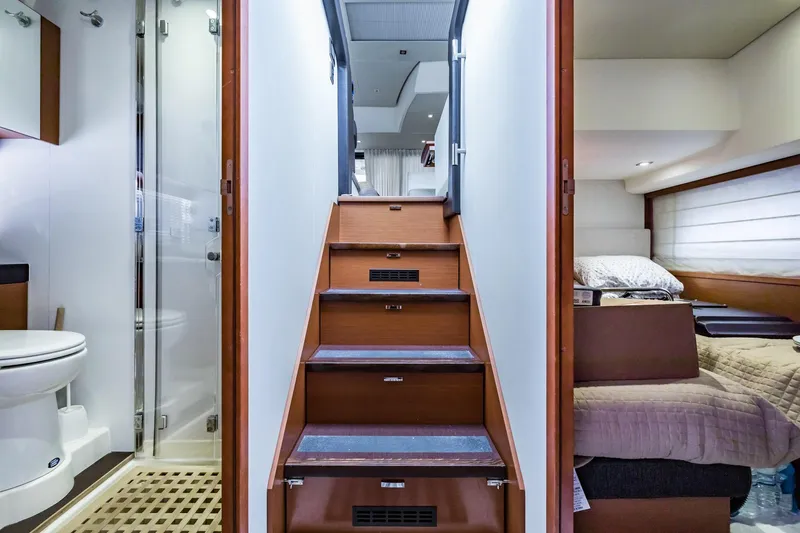 Slide: The Image of Interior of 2013 Prestige 500 Fly yacht with stairs, bathroom, and bedroom. - 23
