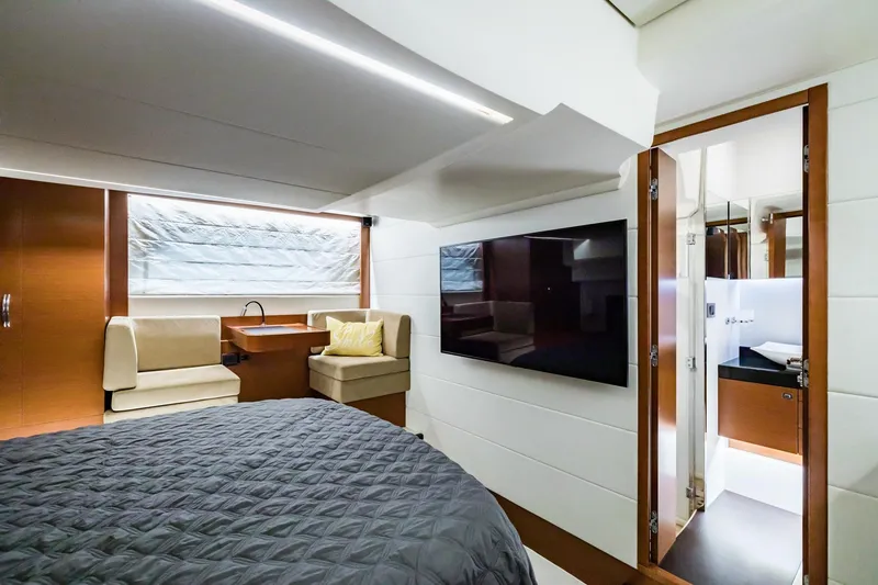 Slide: The Image of Luxurious interior of 2013 Prestige 500 Fly yacht with modern bedroom and ensuite bathroom. - 25