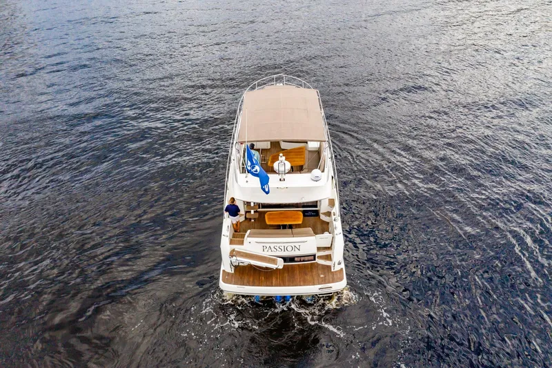 Slide: The Image of Aerial view of 2013 Prestige 500 Fly yacht cruising on open water. - 7