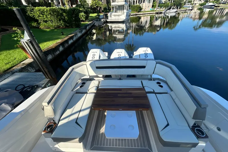 Slide: The Image of 2023 Tiara Yachts 38 LS luxury boat with spacious seating and elegant design. - 12