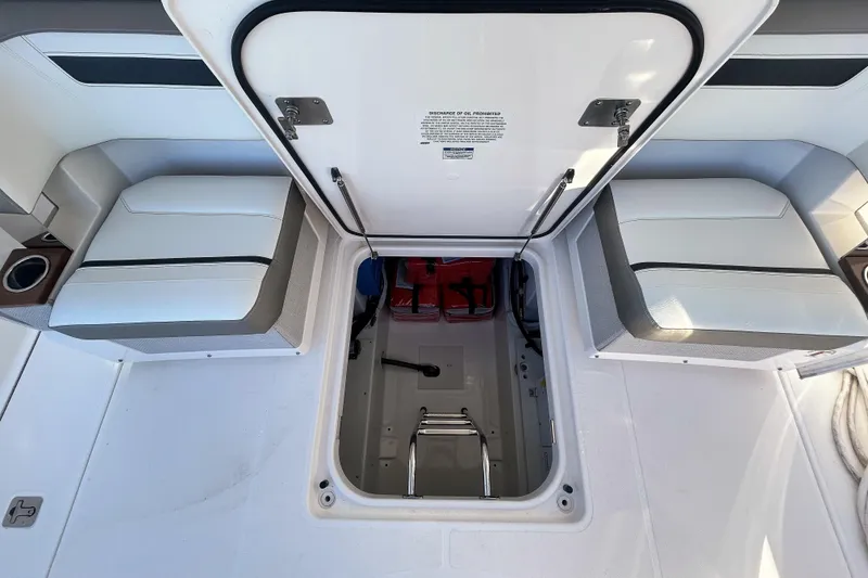 Slide: The Image of 2023 Tiara Yachts 38 LS interior with open hatch and seating area. - 16