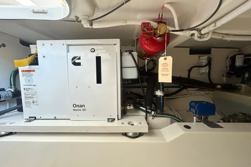 Slide: The Image of Engine room of 2023 Tiara Yachts 38 LS with Cummins Onan Marine QD generator. - 19
