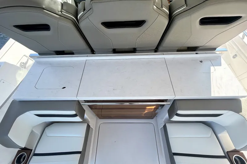 Slide: The Image of 2023 Tiara Yachts 38 LS interior with sleek seating and modern design. - 26