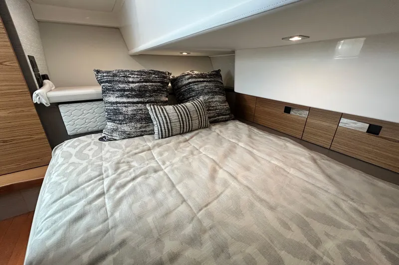 Slide: The Image of Luxurious cabin interior of 2023 Tiara Yachts 38 LS with cozy bedding and modern design. - 32