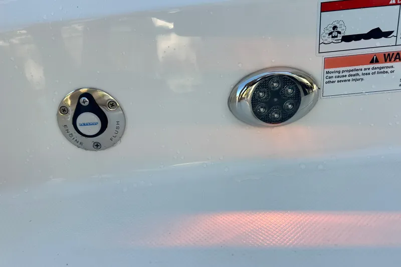 Slide: The Image of 2023 Tiara Yachts 38 LS engine flush and warning label detail. - 57