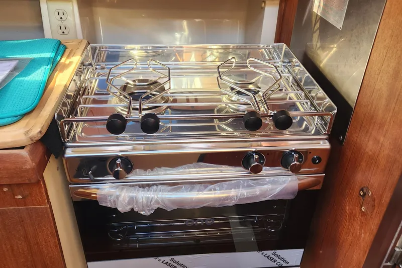 Slide: The Image of Stainless steel stove in 1996 Hunter 376 yacht kitchen. - 13