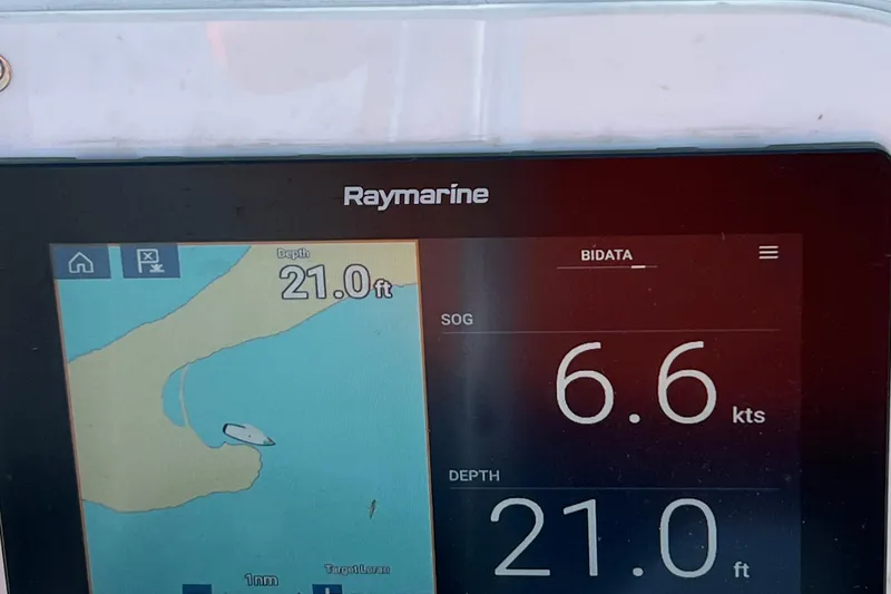 Slide: The Image of Raymarine navigation display showing depth of 21 feet and speed of 6.6 knots. - 20