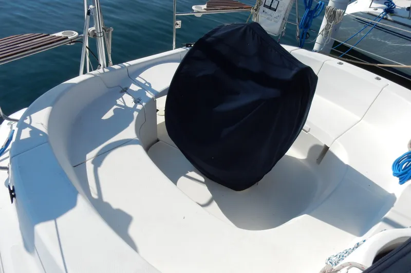 Slide: The Image of Cockpit of a 1996 Hunter 376 sailboat with covered steering wheel. - 42