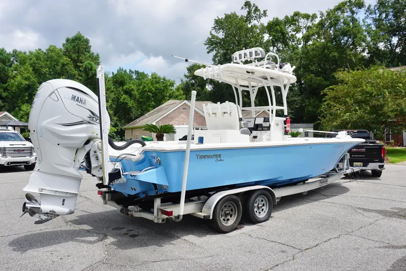 Slide: The Image of 2019 Tidewater 2700 Carolina Bay boat on trailer, featuring Yamaha outboard motor. - 10