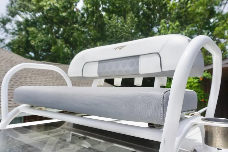 Slide: The Image of 2019 Tidewater 2700 Carolina Bay boat seat with white and gray upholstery. - 27
