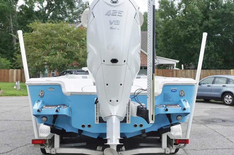Slide: The Image of 2019 Tidewater 2700 Carolina Bay boat with Yamaha 425 V8 engine on trailer. - 8