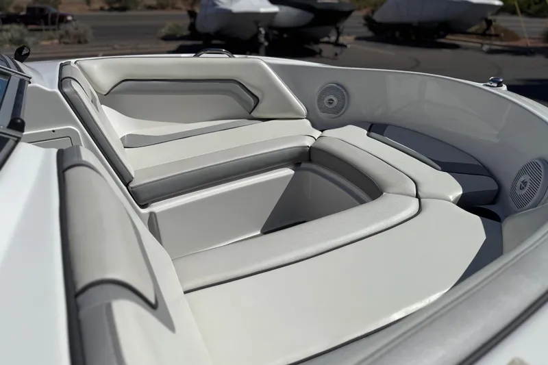 Slide: The Image of 2017 Yamaha AR190 boat interior with cushioned seating and built-in speakers. - 16