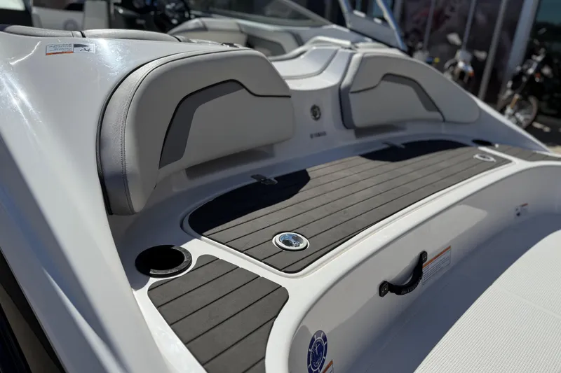 Slide: The Image of 2017 Yamaha Boats AR190 interior with cushioned seating and sleek design. - 20