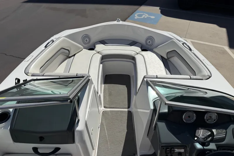 Slide: The Image of 2017 Yamaha Boats AR190 interior with seating and dashboard view. - 24