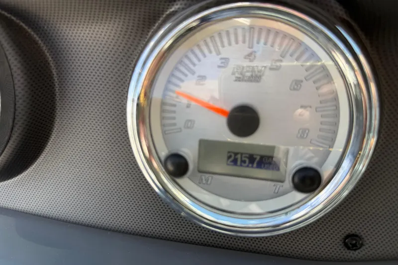 Slide: The Image of Close-up of 2017 Yamaha AR190 boat tachometer displaying 215.7 hours. - 34