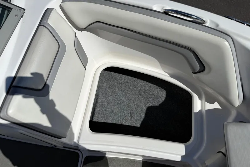 Slide: The Image of 2017 Yamaha AR190 boat interior seating and storage compartment. - 37