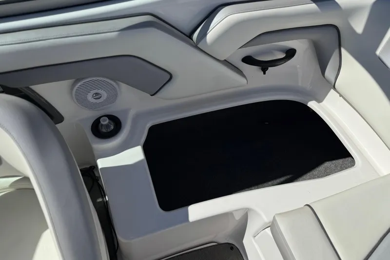 Slide: The Image of Interior of a 2017 Yamaha AR190 boat, featuring seating and speaker. - 43