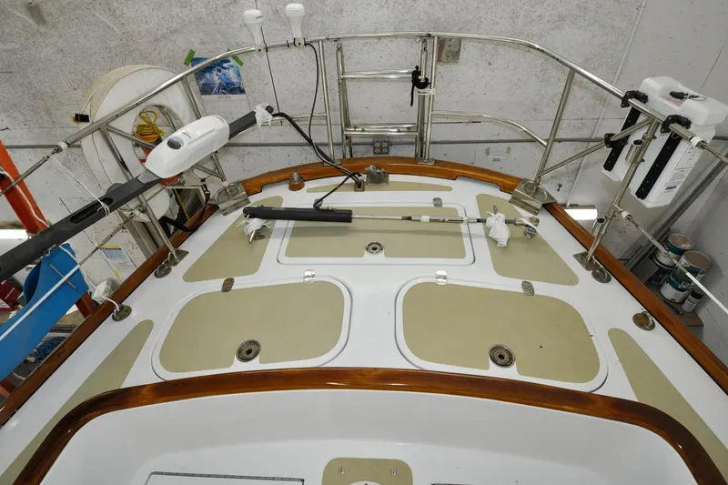 Slide: The Image of 1986 Hinckley Sou'wester 51 yacht deck with equipment and storage compartments. - 20